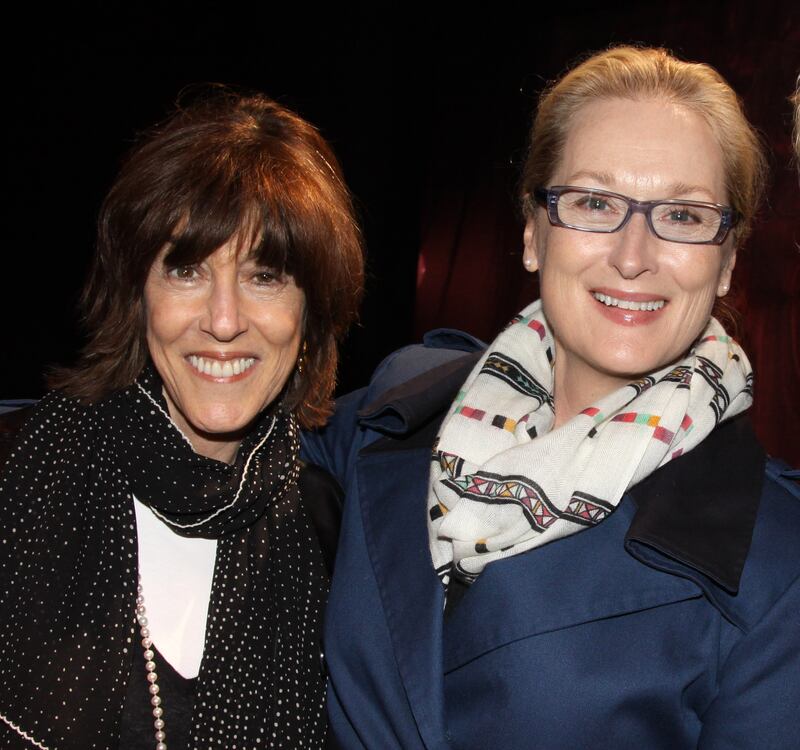 Actress Meryl Streep who portrayed a character based on Nora Ephron’s semi-autobiographical novel of the same name ‘Heartburn’ in  1986 poses with director, writer Nora Ephron backstage at "Love, Loss and What I Wore" on Broadway at The Westside Theatre on October 28, 2009 in New York City.