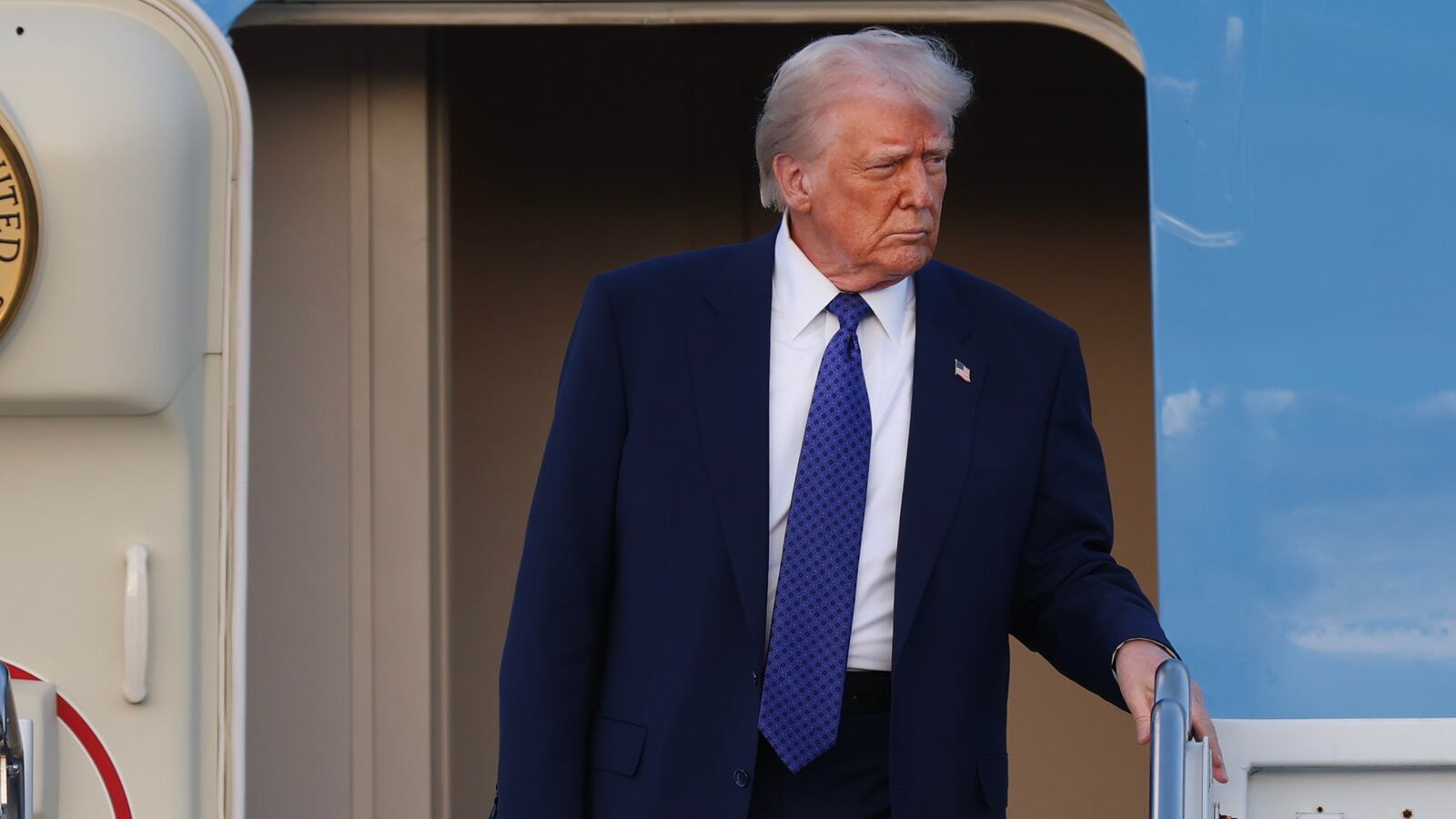 WEST PALM BEACH, FLORIDA - FEBRUARY 14: US President Donald Trump exits from Air Force One at Palm Beach International Airport on February 14, 2025 in West Palm Beach, Florida. President Trump is scheduled to spend the weekend at his Mar-a-Lago home. (Photo by Joe Raedle/Getty Images)
