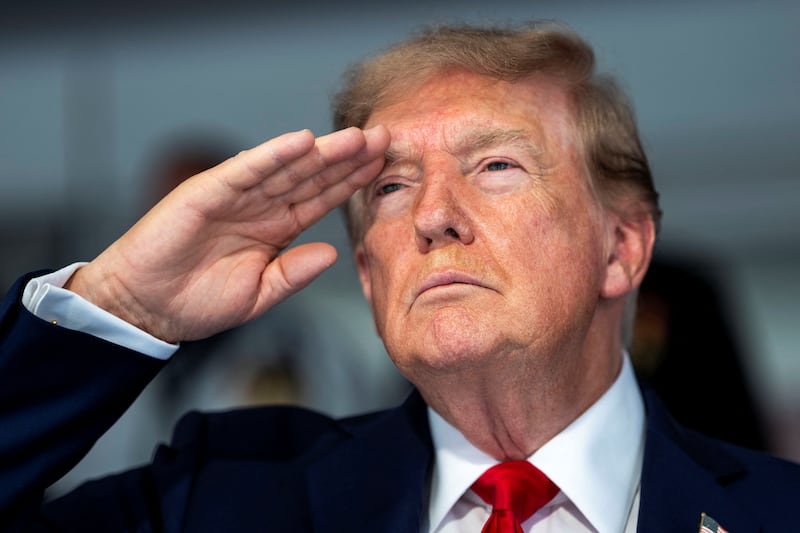 President Donald Trump during the National Anthem at the start of the Freedom 250 Grand Prix Race on the streets of Washington, DC,  Sunday, Aug. 23, 2026.