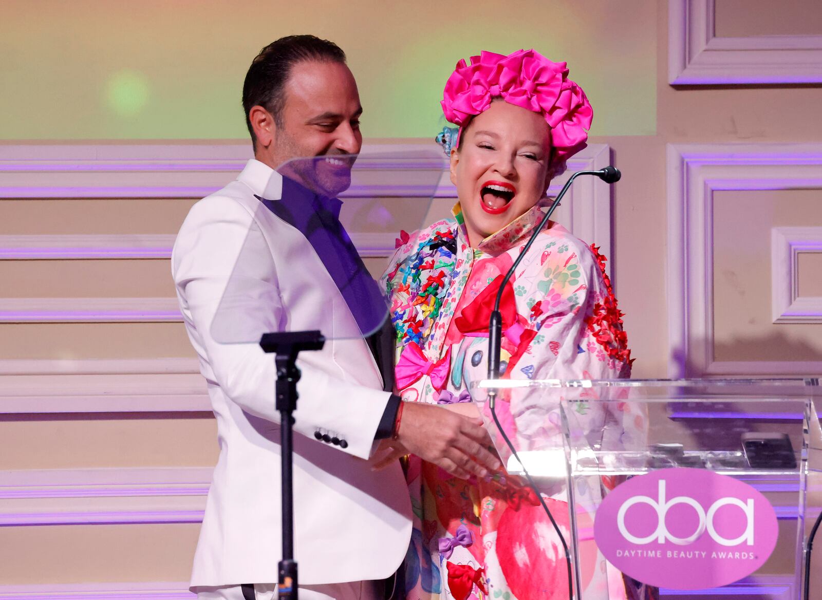 Singer Sia (right) in with plastic surgeon Ben Talei at the 5th Daytime Beauty Awards on October 1, 2023. According to Griffin, Sia's before-and-after photos compelled her to seek treatment from Dr. Talei.