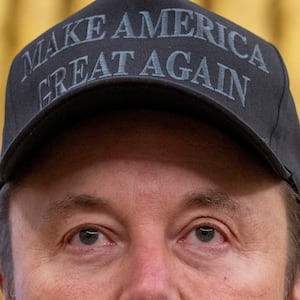 Tesla and SpaceX CEO Elon Musk looks on before US President Donald Trump signs executive orders in the Oval Office of the White House in Washington, DC, on February 11, 2025.