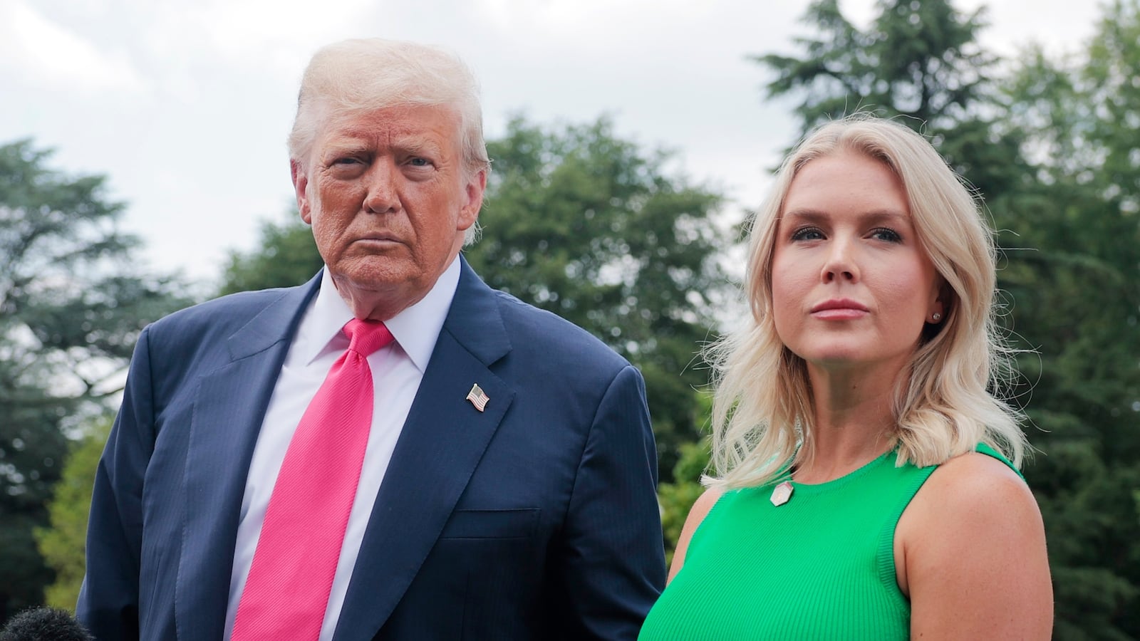 President Donald Trump, joined by White House Press Secretary Karoline Leavitt, speaks to the media as he departs the White House on July 15, 2025 in Washington, DC.