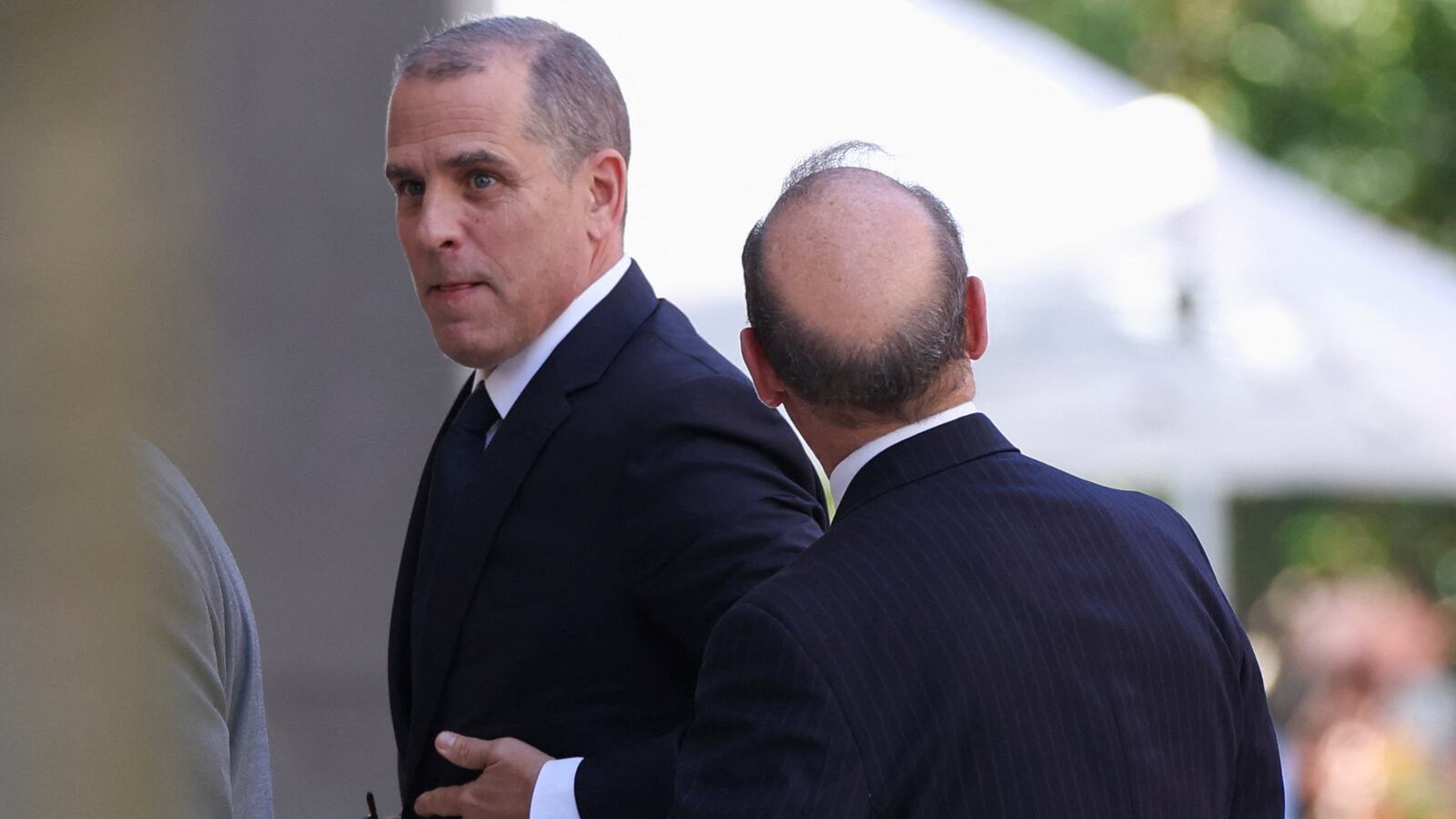 Hunter Biden walks into a federal court to face gun charges in Wilmington, Delaware, Oct. 3, 2023.
