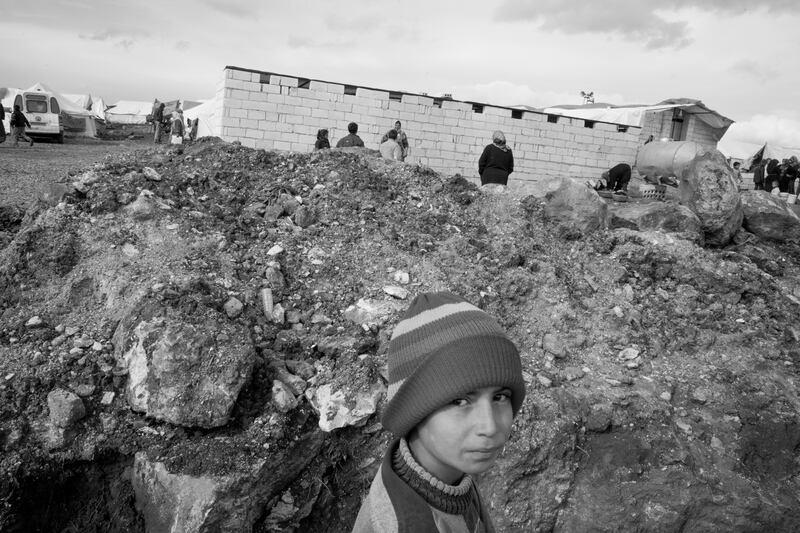 galleries/2013/01/09/photos-from-atima-a-syrian-refugee-camp-on-the-turkish-border/syrian-refugees-Atima-sayman-gallery-intro_hxt9jf