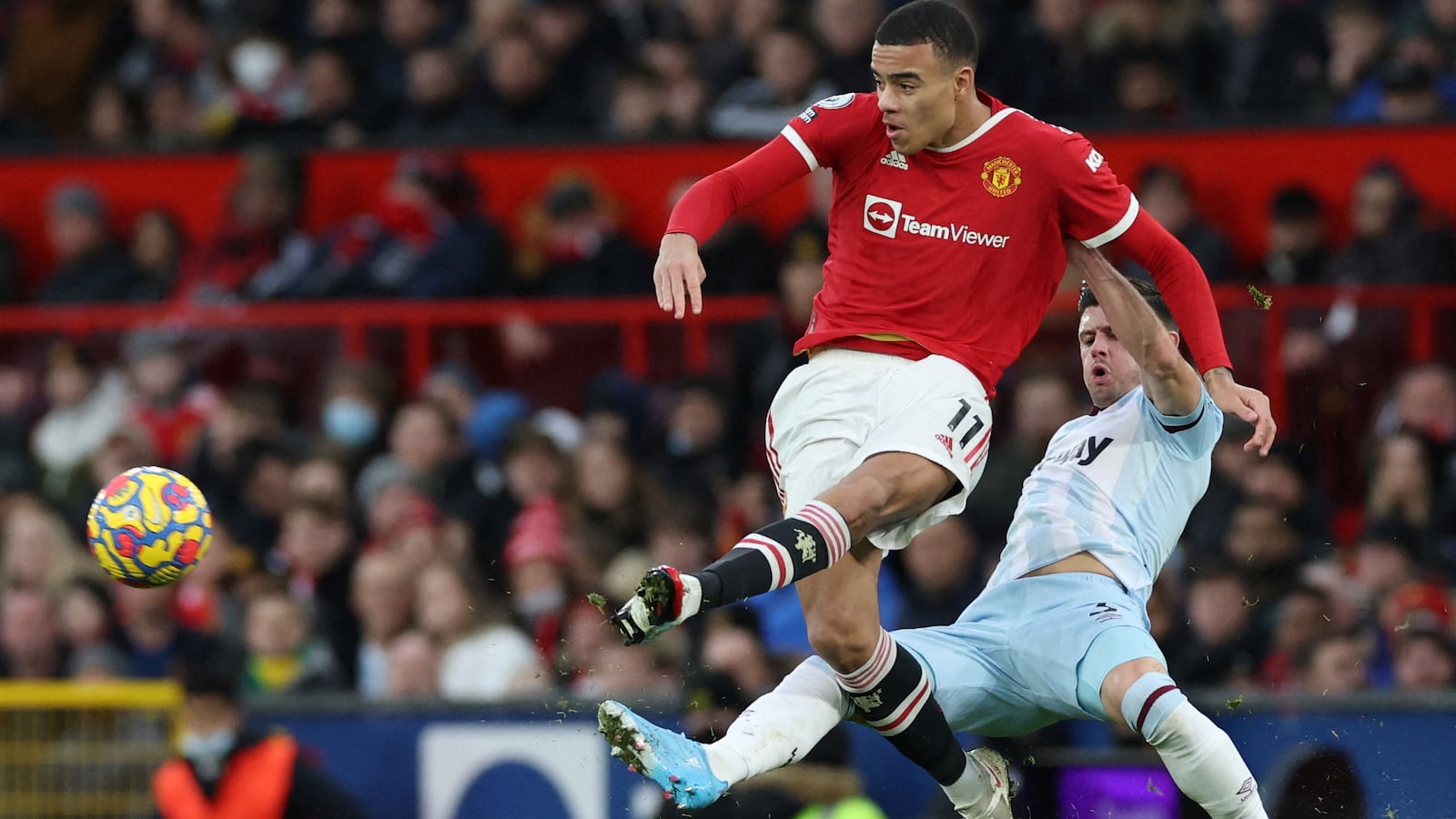 2022-01-30T093539Z_2003389266_RC2F4S9X5V76_RTRMADP_3_SOCCER-ENGLAND-MUN-MASON-GREENWOOD_aledtg