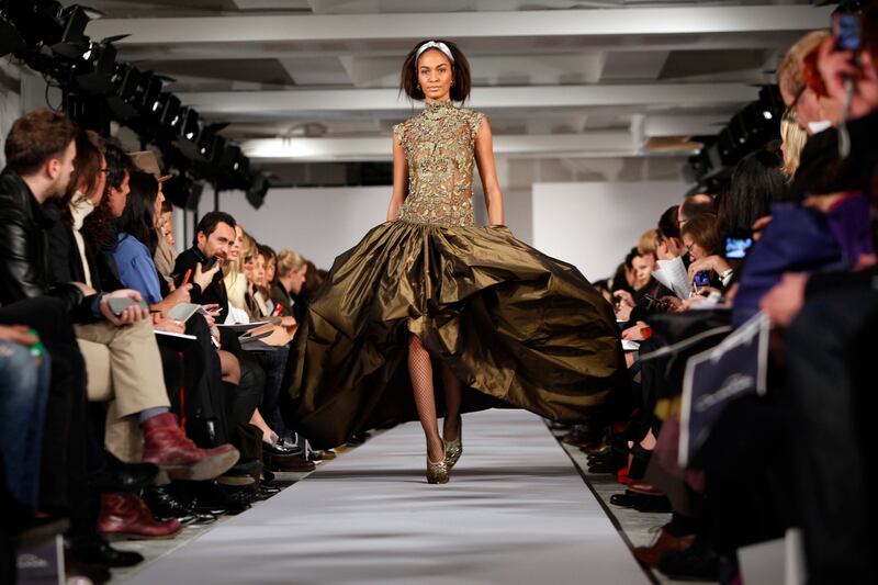 galleries/2014/10/21/oscar-de-la-renta-dead-at-82-his-life-in-photos/141020-oscar-2_qvcjkf