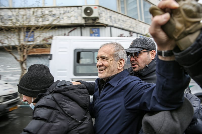 TEHRAN, IRAN - MARCH 13: Iranian President Masoud Pezeshkian attends the Quds Day march in Tehran, Iran, on March 13, 2026. (Photo by Hassan Ghaedi/Anadolu via Getty Images)