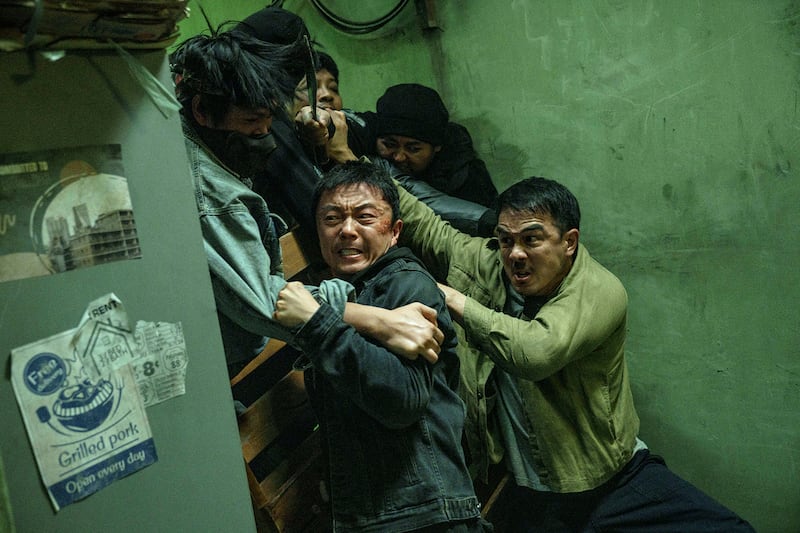 Xie Miao and Joe Taslim.