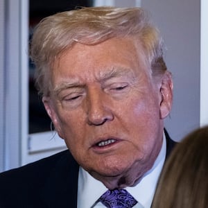 IN FLIGHT - NOVEMBER 30: President Donald Trump speaks to the press aboard Air Force One en-route to Washington, DC on November 30, 2025. The first family is returning to Washington, DC after spending the Thanksgiving holiday at Mar-A-Lago Resort In Florida.  (Photo by Pete Marovich/Getty Images)