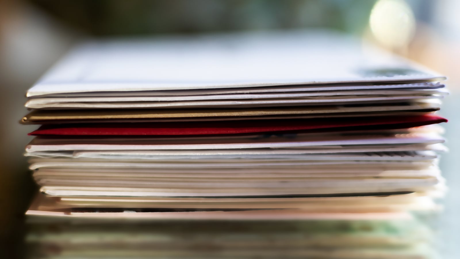 A photo of a stack of letters and cards.