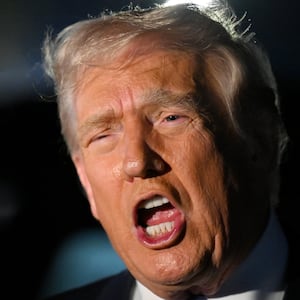 U.S. President Donald Trump speaks to reporters before boarding Air Force One on November 16, 2025 at Palm Beach International Airport in West Palm Beach, Florida.