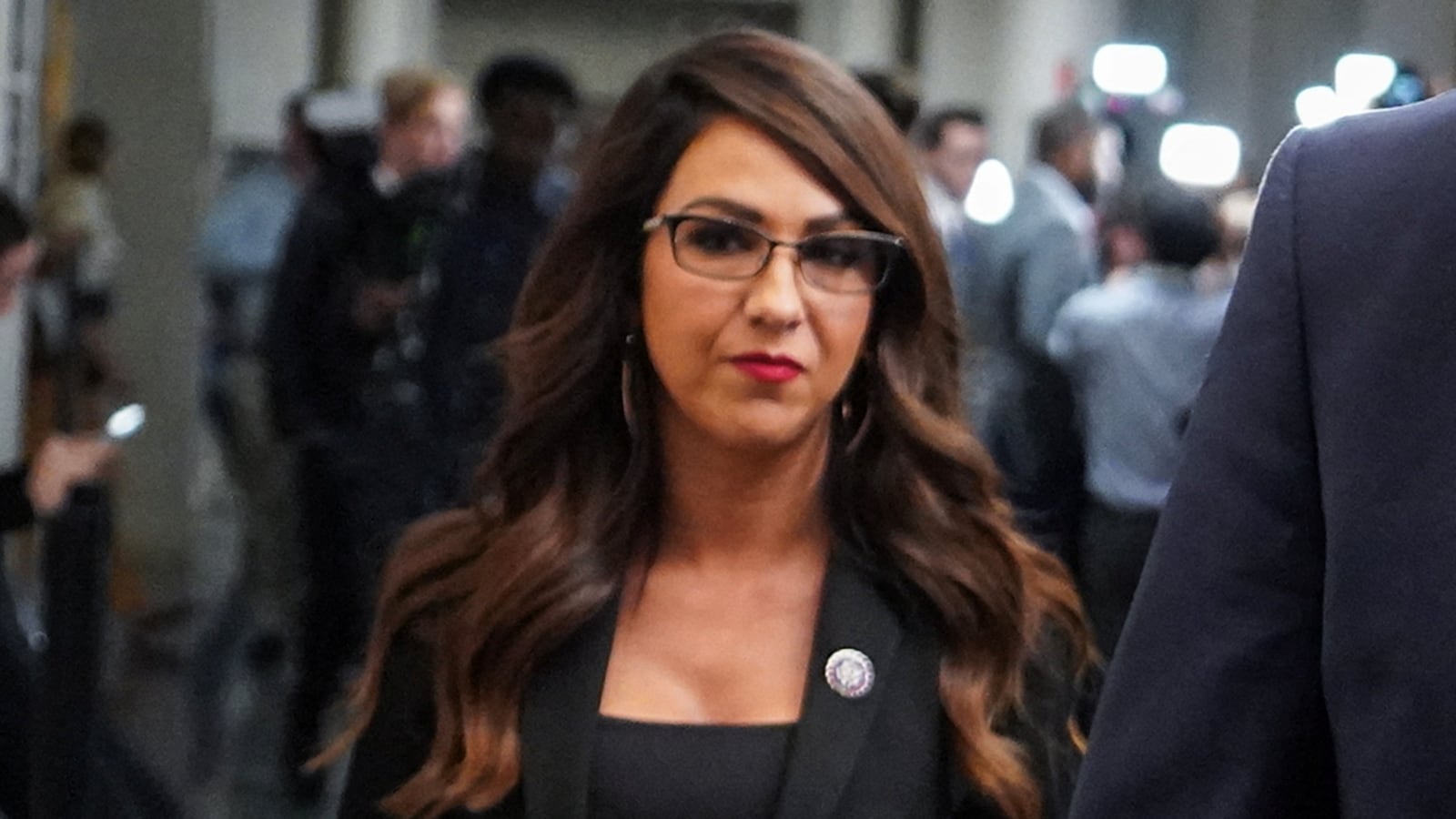 Lauren Boebert (R-CO) departs during a break in a House Republican Conference meeting as Republicans work to restart their effort to pick a new leader
