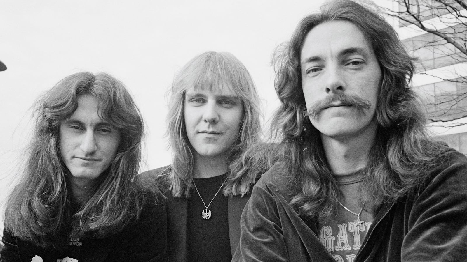 Bassist Geddy Lee, Guitarist Alex Lifeson and drummer Neil Peart from Canadian progressive rock band Rush.