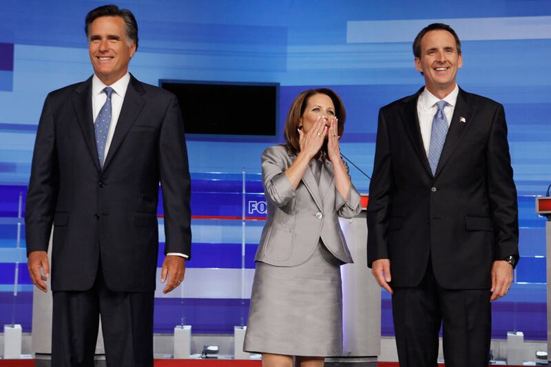 articles/2011/08/11/rick-perry-mitt-romney-lead-republicans-iowa-debate/gop-debate-wrap-tomasky_shgpls