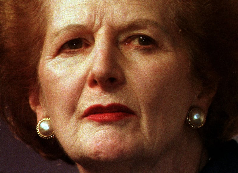 Former Prime Minister Margaret Thatcher listens on the third day of the Conservative Party Conference on October 9, 1997.