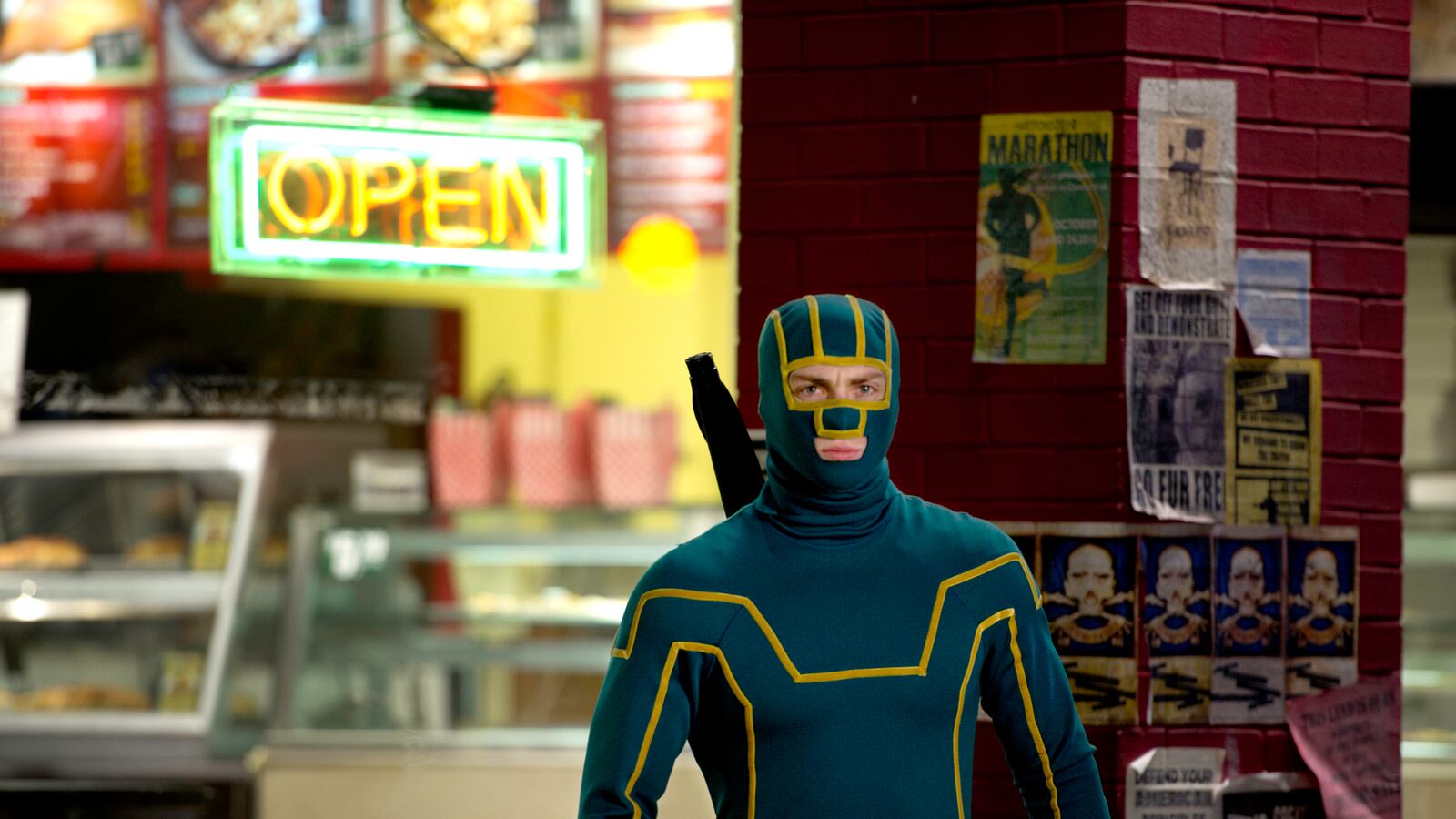 articles/2013/08/19/violence-in-kick-ass-2-the-comic-book-vs-the-movie/130818-Kezra-kickass2-tease_czvnwq