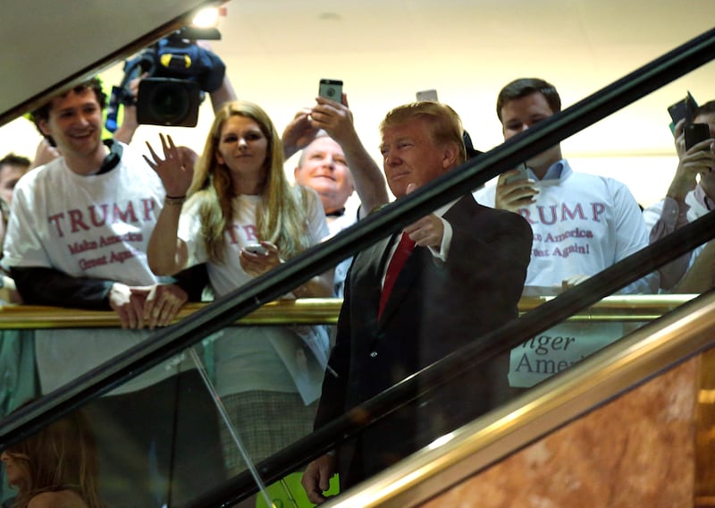 Donald Trump arrives by escalator inside at Trump Tower to announce
 his campaign for the 2016 Republican presidential nomination