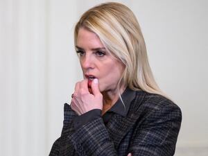 Attorney General Pam Bondi (R) speaks with the Deputy Attorney General Todd Blanche following a ceremony with President Donald Trump and the Florida Panthers of the National Hockey League, winners of the 2025 Stanley Cup, in the East Room of the White House in Washington, DC on January 15, 2026.