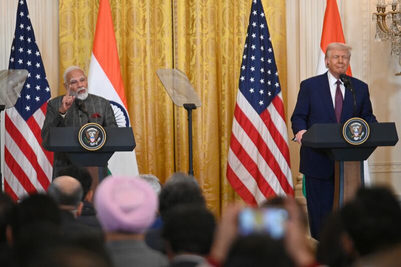 U.S. President Donald Trump (R) and Indian Prime Minister Narendra Modi (L) hold joint news conference