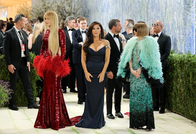 Nicole Kidman, Lauren Sanchez and Anna Wintour pose during the Met Gala, an annual fundraising gala held for the benefit of the Metropolitan Museum of Art's Costume Institute with this year's theme 'Costume Art' in New York City, New York, U.S., May 4, 2026. REUTERS/Daniel Cole