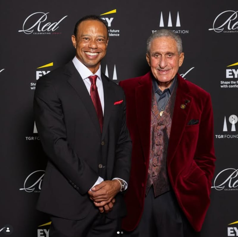 Tiger Woods and Arthur Blank.