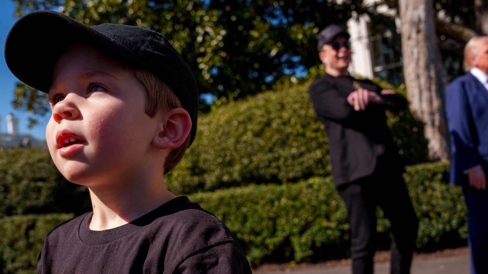 WASHINGTON, DC - MARCH 11: X Æ A-Xii, the son of White House Senior Advisor, Tesla and SpaceX CEO Elon Musk, walks across the driveway as Musk and U.S. President Donald Trump speak alongside a Tesla Model Y on the South Lawn of the White House on March 11, 2025 in Washington, DC. Trump spoke out against calls for a boycott of Elon Musk's companies and plans to purchase a Tesla vehicle in what he calls a 'show of confidence and support' for Elon Musk. (Photo by Andrew Harnik/Getty Images)