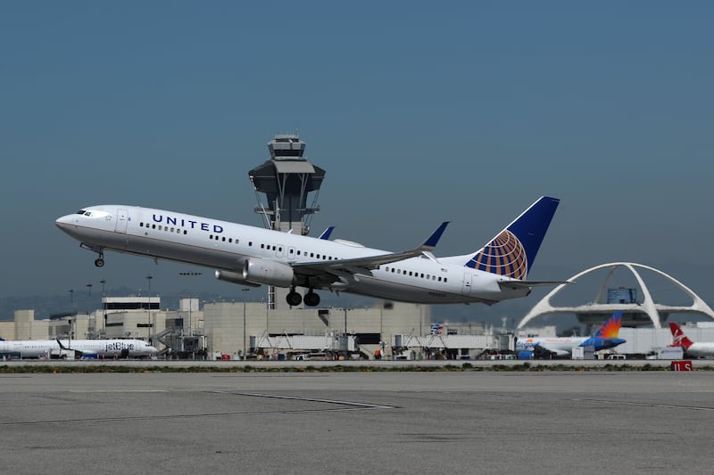 A United Airlines Boeing 737-900ER plane takes off from Los Angeles International airport (LAX) in Los Angeles, California, U.S. March 28, 2018.