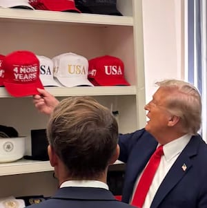 Donald Trump with MAGA hat collection