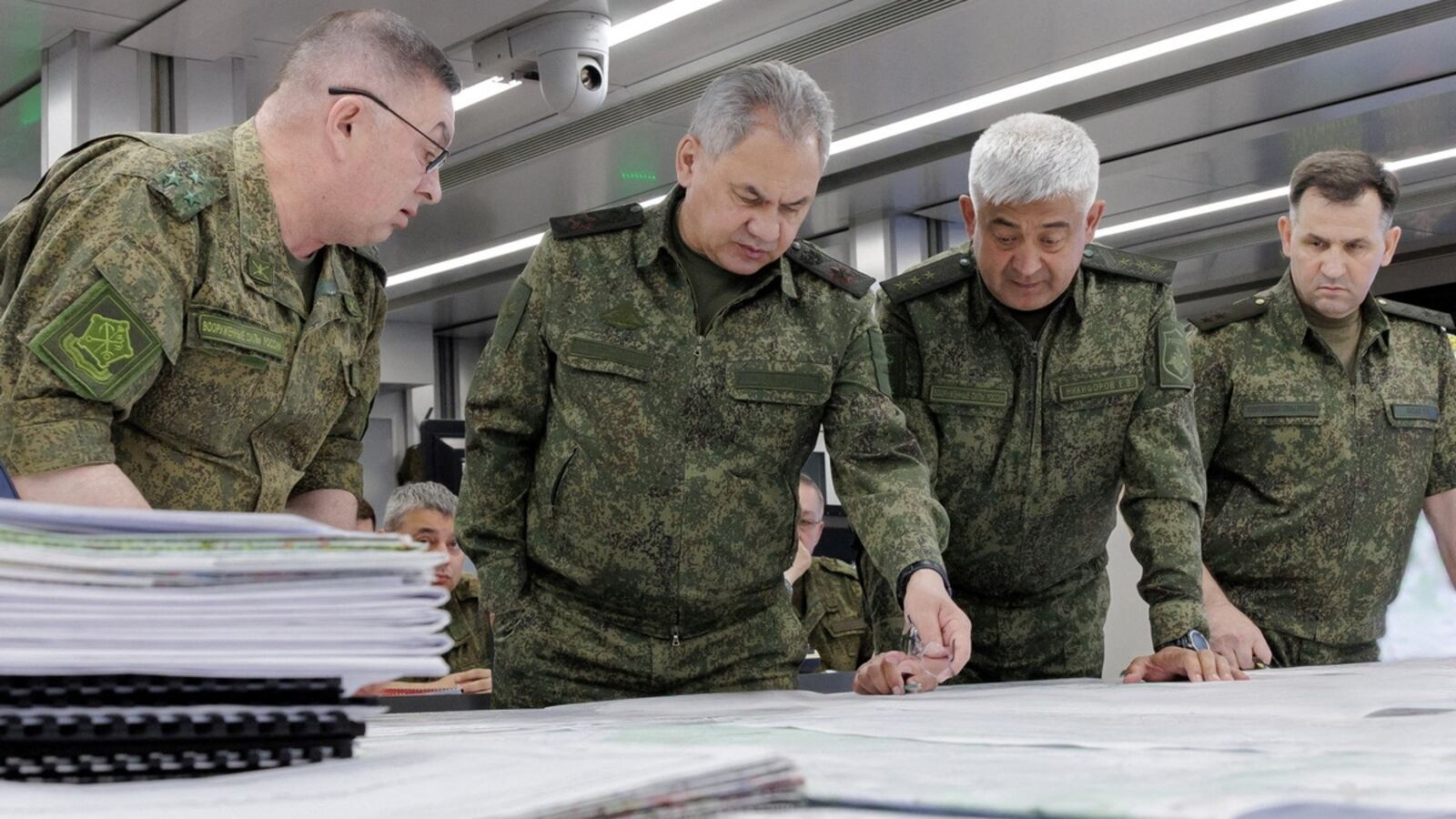 Russian Defense Minister Sergei Shoigu and Colonel General Yevgeny Nikiforov (2-R) at an unknown location in this picture released June 26, 2023.