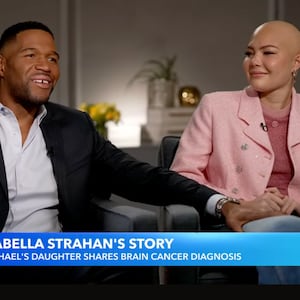 Michael Strahan sits beside his daughter, Isabella, as the two open up about her cancer battle in a new interview.
