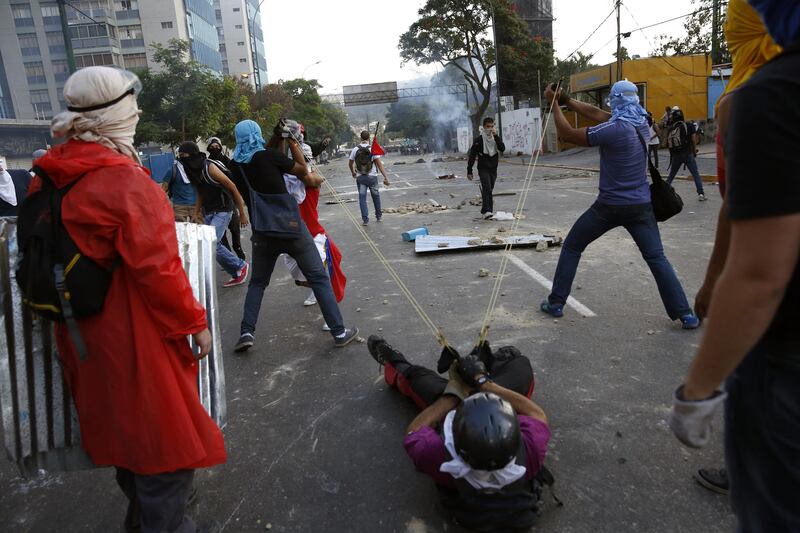 galleries/2014/02/14/venezuela-erupts-in-violence-photos/140310-venezuela4_nvhpje