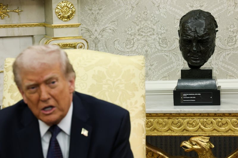 President Donald Trump speaks alongside a bust of former UK Prime Minister Winston Churchill during a bilateral meeting with German Chancellor Friedrich Merz in the Oval Office of the White House on March 03, 2026, in Washington, DC.