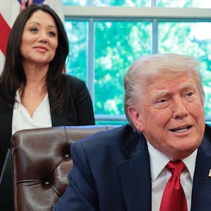President Donald Trump speaks to the media as Secretary of Labor Lori Chavez-DeRemer look on after signing executive orders in the Oval Office at the White House on April 23, 2025 in Washington, DC.