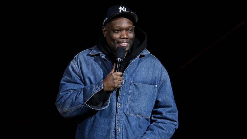 Michael Che performs onstage during the Comic Relief Live 2025: A Benefit to Build Brighter Futures for Kids in 2025 in New York City. Che's will tape his third Netflix stand-up special in August. (Photo by Roy Rochlin/Getty Images for Comic Relief)