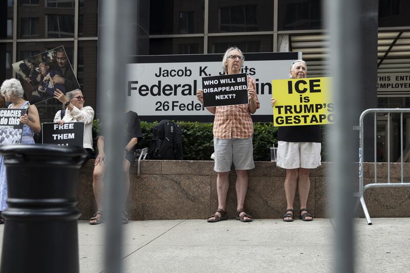 NEW YORK, UNITED STATES - August 14: People take part in a silent vigil outside 26 Federal Plaza to protest the treatment of immigrants and demand an end to detentions and deportations in Manhattan, United States on August 14, 2025. (Photo by Mostafa Bassim/Anadolu via Getty Images)