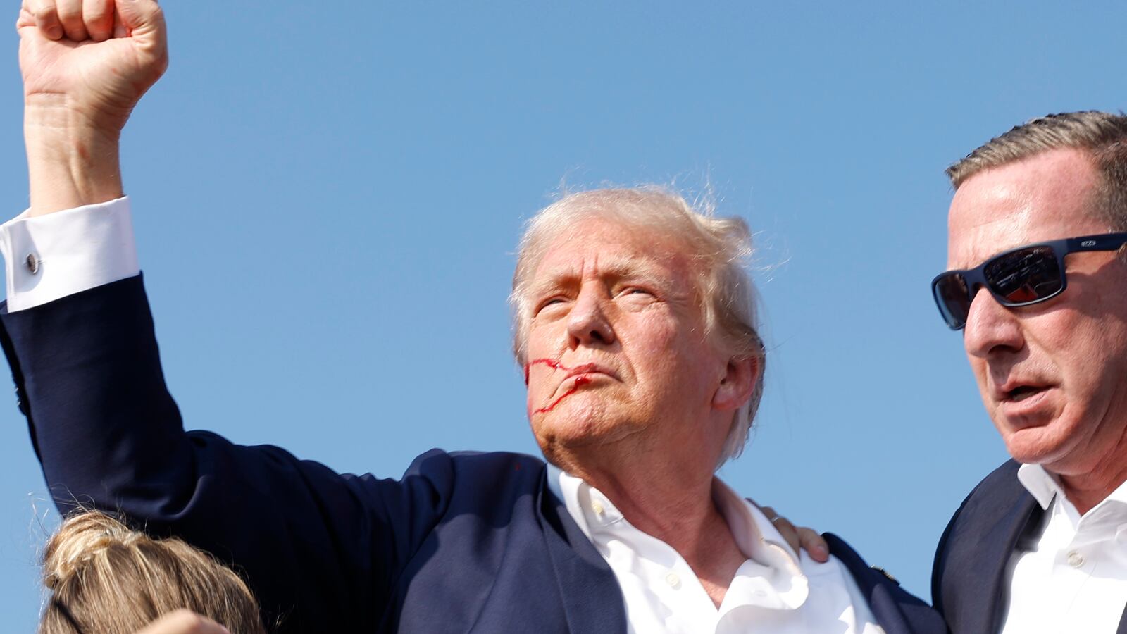 Donald Trump is rushed offstage after being shot during a rally on July 13 in Butler, Pennsylvania.