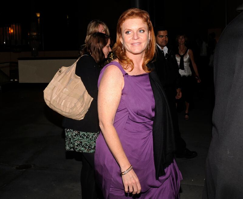 Britain's Duchess of York, Sarah Ferguson, leaves the Variety Children's Charity 2010 Hollywood World Conference in Los Angeles May 23, 2010. Britain's Duchess of York, caught on camera apparently offering to sell access to her ex-husband, UK trade envoy Prince Andrew, said Sunday she was sorry for her "serious lapse in judgement."