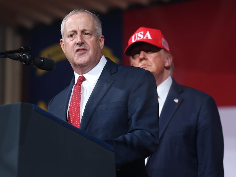 Michael Whatley. speaks as U.S. President Donald Trump looks on during a campaign rally at Gastonia Municipal Airport on September 16, 2026