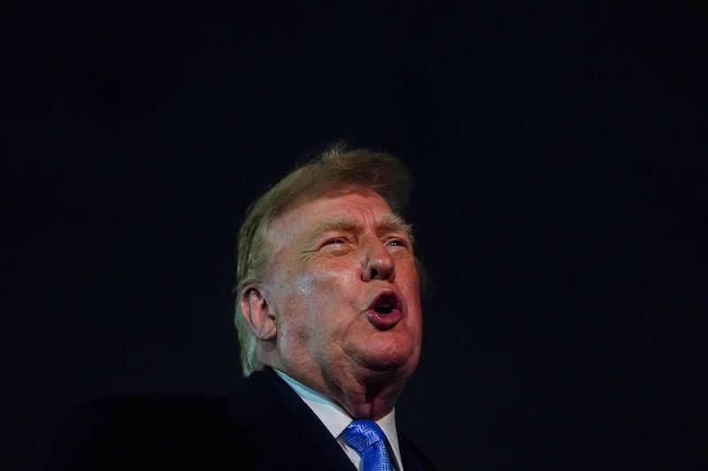 President Donald Trump speaks to reporters after exiting Air Force One as he returns from Medinah, Illinois, at Joint Base Andrews, Maryland, September 27, 2026.