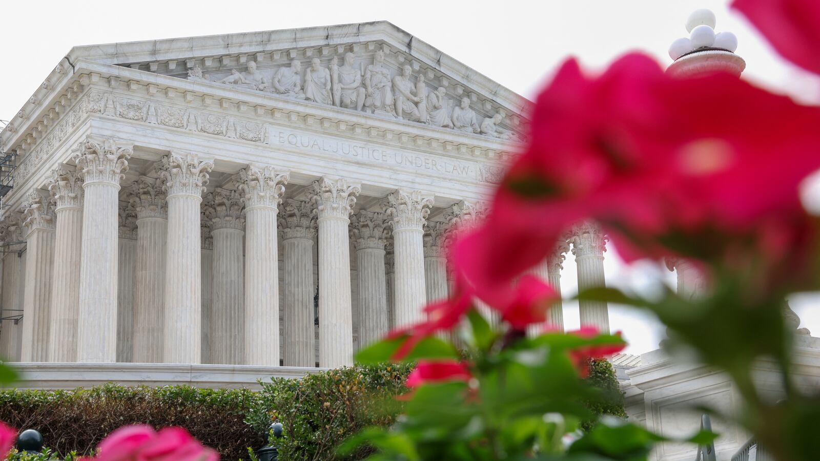 Flowers bloom outside the United States Supreme Court building in Washington, U.S., June 20, 2023.
