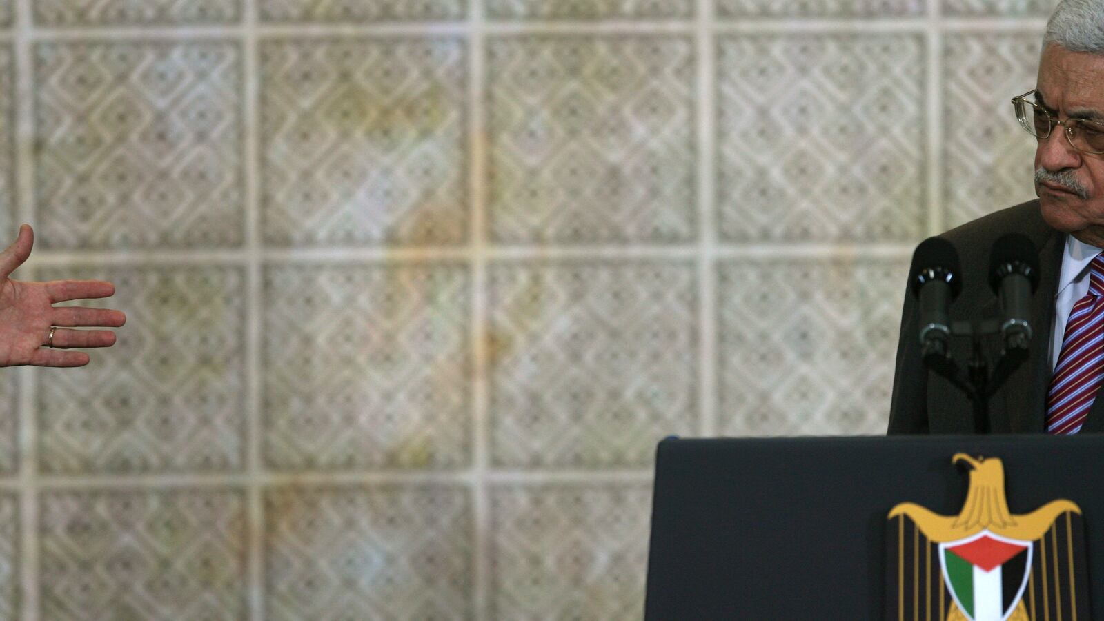 articles/2012/06/08/america-s-iconsequential-anger/bush-hand-abbas-openz_rxrazv