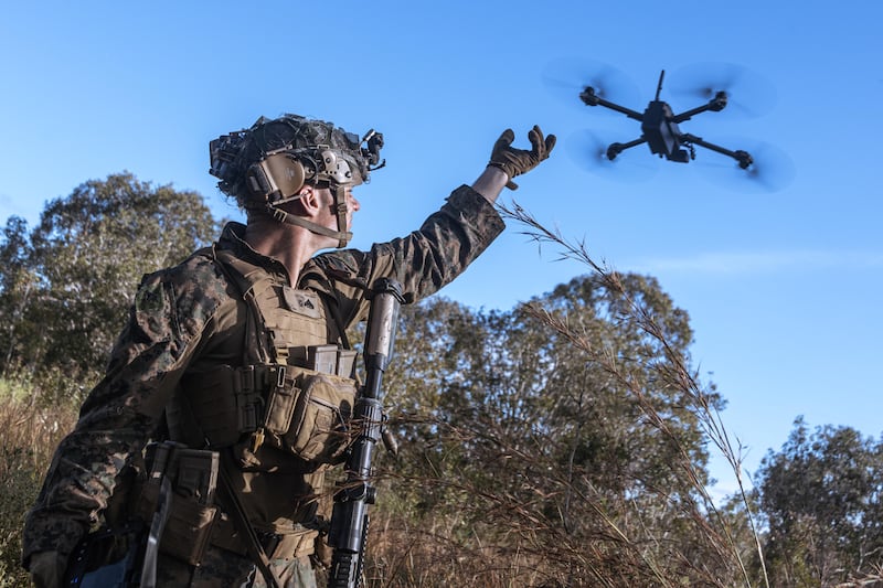 U.S. Marine Corps Cpl. Calvin Burke, an intelligence specialist, with Animal Company, Battalion Landing Team 1st Battalion, 7th Marine Regiment, 31st Marine Expeditionary Unit, activates a Skydio X2 small unmanned aerial system (SUAS) to survey the defensive line for opposing forces during a simulated assault and seizure at Glen Airfield, Queensland, Australia, July 2-7, 2025.