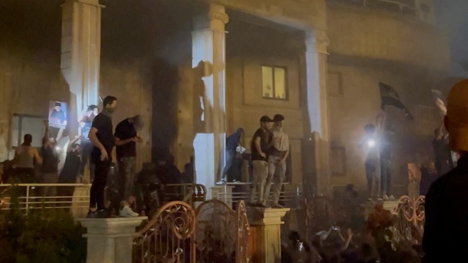 Protesters storm the Swedish embassy ahead of an expected Quran burning in Stockholm, in Baghdad, Iraq June 20, 2023.