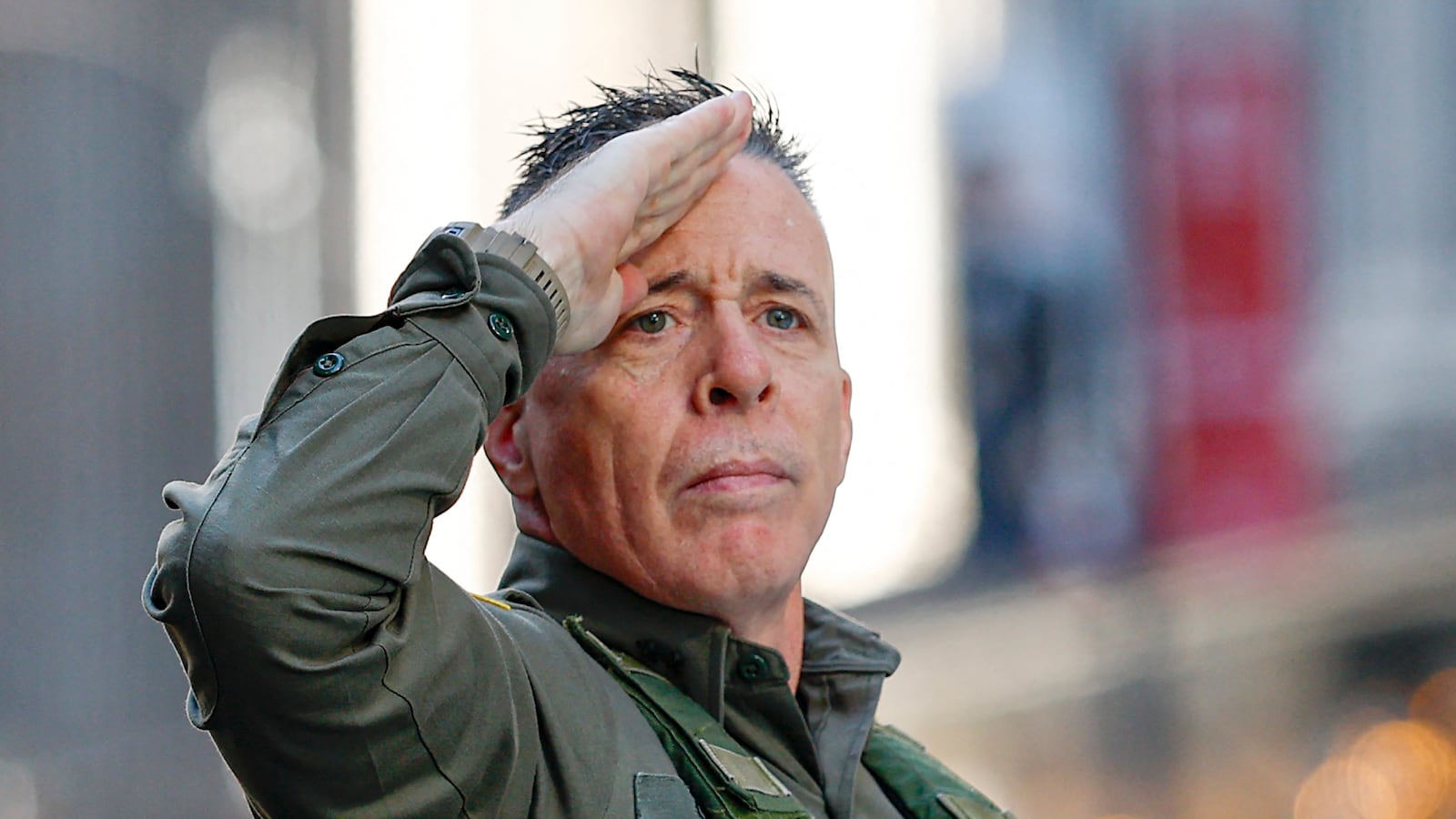 US Customs and Border Patrol Commander Gregory Bovino (C) leaves federal court at Dirksen Federal Building after his hearing in Chicago, Illinois, on October 28, 2025. Bovino was ordered to appear in federal court for violating a temporary restraining order issued by District Judge Sara Ellis that orders immigration enforcement agents to limit use of tear gas and other crowd-suppression items except when there is an imminent threat. (Photo by KAMIL KRZACZYNSKI / AFP) (Photo by KAMIL KRZACZYNSKI/AFP via Getty Images)