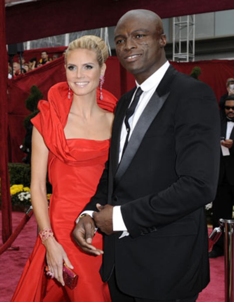 galleries/2010/03/09/i-m-outta-here/moving-threats---heidi-klum-seal_i7tafz