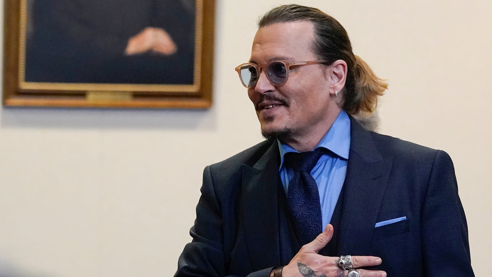 2022-05-27T194313Z_963755162_RC2UFU989V7Q_RTRMADP_3_PEOPLE-DEPP_cjsane