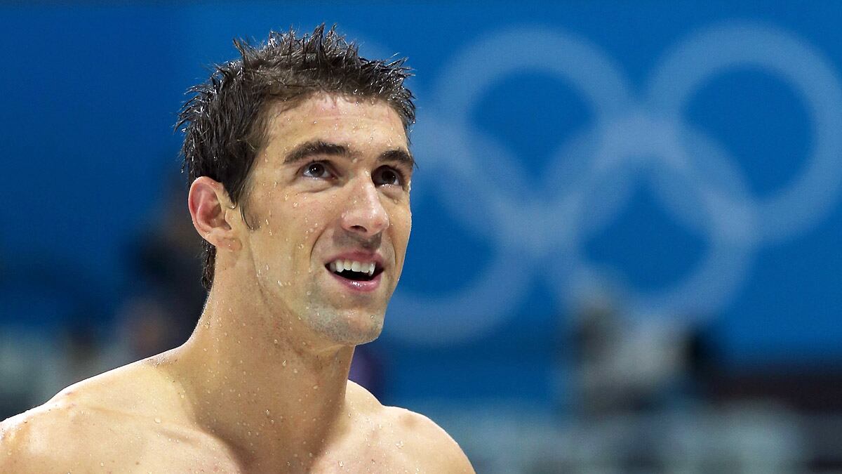 cheats/2012/08/12/america-takes-home-46-golds/michael-phelps-moments-ew_e16gt8