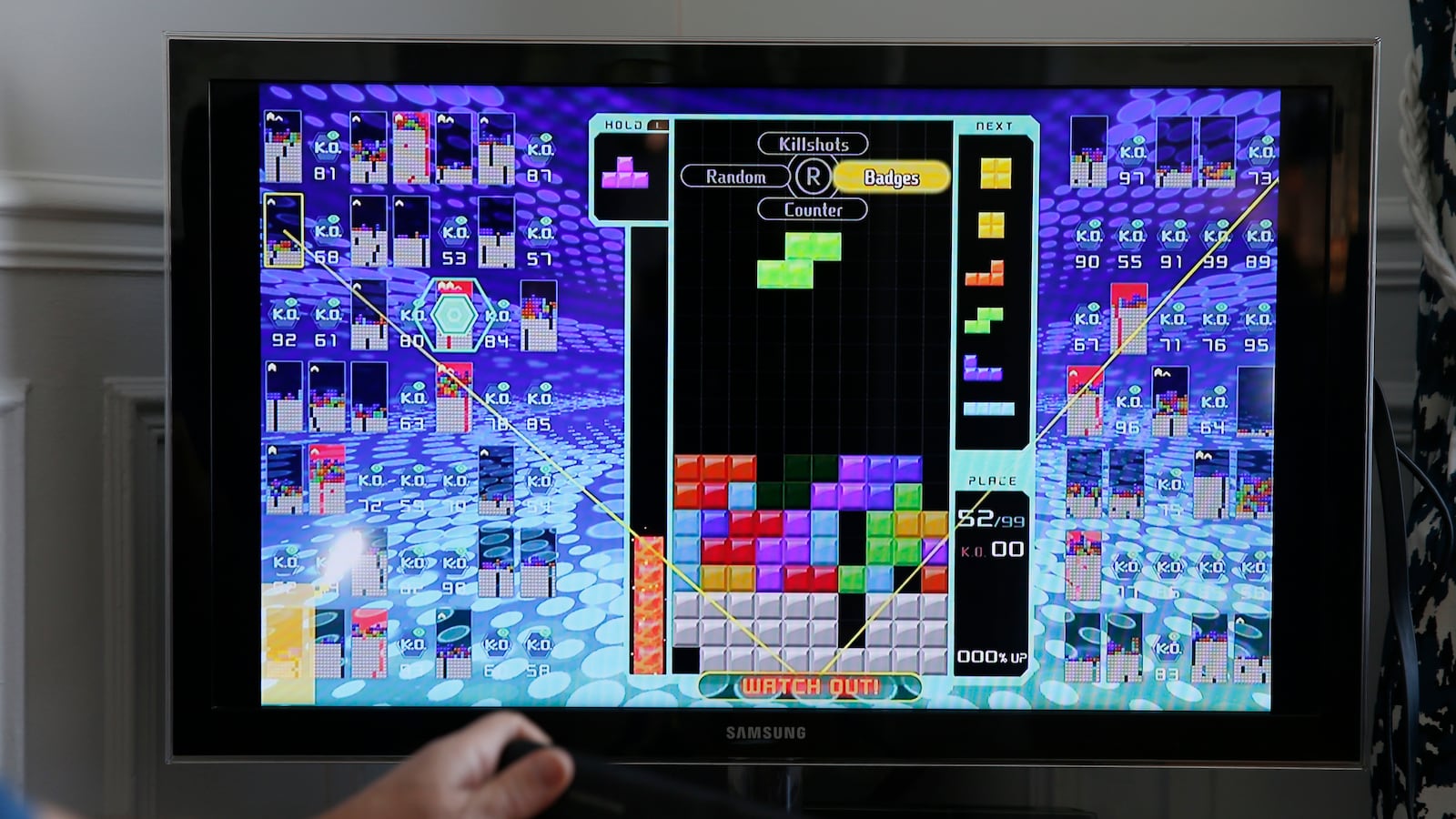 a gamer plays the game Tetris 99 developed by Arika and published by Nintendo on February 18, 2019 in Paris, France