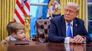 X Musk, the son of Tesla and SpaceX CEO Elon Musk, stands next to U.S. President Donald Trump during an executive order signing in the Oval Office at the White House on February 11, 2025 in Washington, DC.