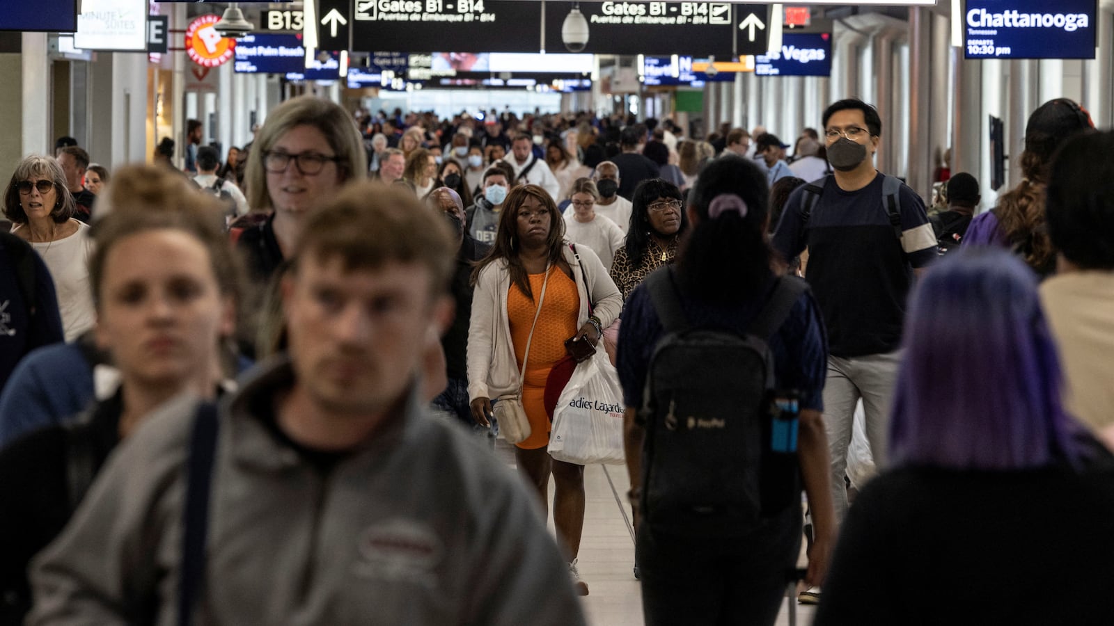 Passengers walk along terminal B of Hartsfield-Jackson Atlanta International Airport in Atlanta.